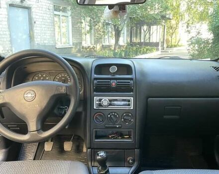 Красный Опель Астра, объемом двигателя 1.4 л и пробегом 177 тыс. км за 4600 $, фото 22 на Automoto.ua