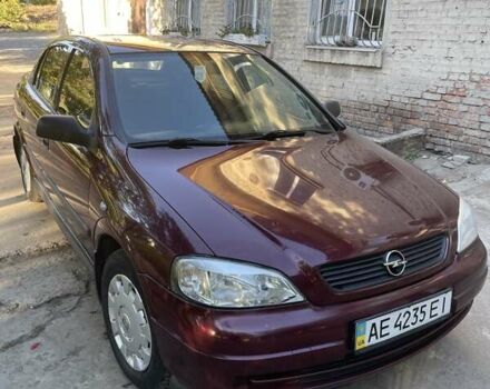 Красный Опель Астра, объемом двигателя 1.4 л и пробегом 177 тыс. км за 4600 $, фото 2 на Automoto.ua