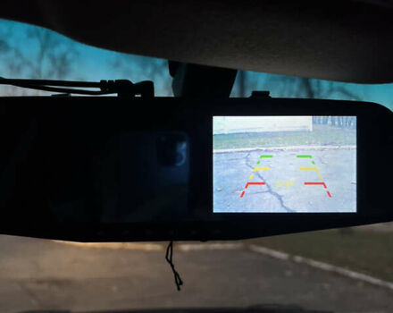 Красный Опель Астра, объемом двигателя 1.39 л и пробегом 187 тыс. км за 4800 $, фото 10 на Automoto.ua