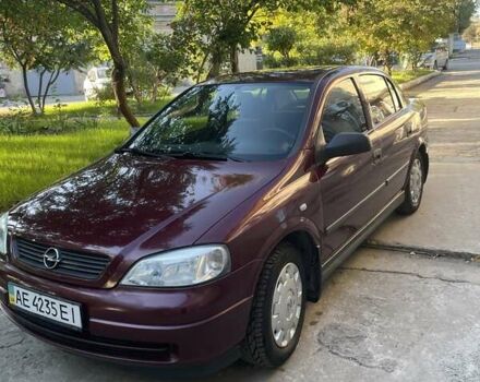 Красный Опель Астра, объемом двигателя 1.4 л и пробегом 177 тыс. км за 4600 $, фото 3 на Automoto.ua