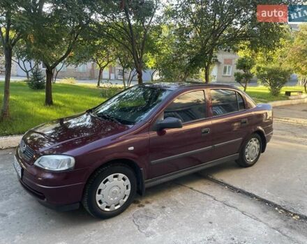 Красный Опель Астра, объемом двигателя 1.4 л и пробегом 177 тыс. км за 4600 $, фото 13 на Automoto.ua