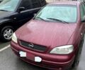 Красный Опель Астра, объемом двигателя 1.6 л и пробегом 310 тыс. км за 3300 $, фото 1 на Automoto.ua