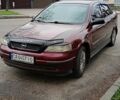Красный Опель Астра, объемом двигателя 1.6 л и пробегом 183 тыс. км за 4200 $, фото 1 на Automoto.ua