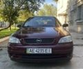 Красный Опель Астра, объемом двигателя 1.4 л и пробегом 177 тыс. км за 4600 $, фото 1 на Automoto.ua