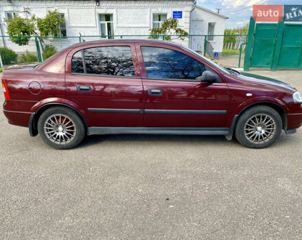 Красный Опель Астра, объемом двигателя 1.4 л и пробегом 102 тыс. км за 4750 $, фото 4 на Automoto.ua