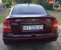 Красный Опель Астра, объемом двигателя 1.6 л и пробегом 250 тыс. км за 4700 $, фото 2 на Automoto.ua