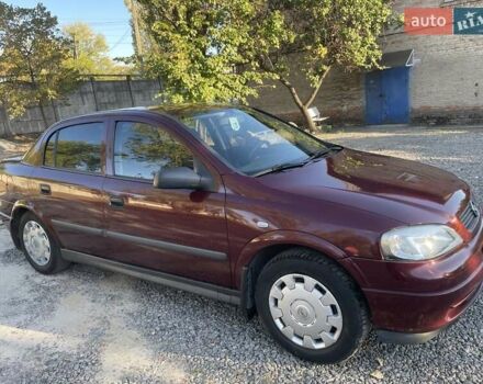 Красный Опель Астра, объемом двигателя 1.4 л и пробегом 177 тыс. км за 4600 $, фото 10 на Automoto.ua