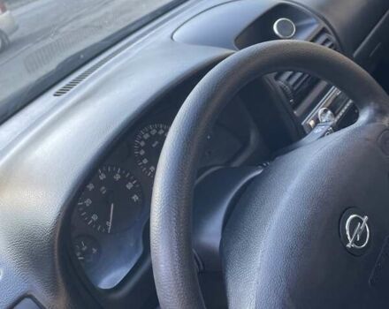 Красный Опель Астра, объемом двигателя 1.4 л и пробегом 177 тыс. км за 4600 $, фото 28 на Automoto.ua