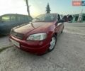 Красный Опель Астра, объемом двигателя 1.36 л и пробегом 270 тыс. км за 3100 $, фото 1 на Automoto.ua
