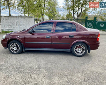 Красный Опель Астра, объемом двигателя 1.4 л и пробегом 102 тыс. км за 4750 $, фото 8 на Automoto.ua
