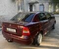 Красный Опель Астра, объемом двигателя 1.4 л и пробегом 177 тыс. км за 4600 $, фото 8 на Automoto.ua