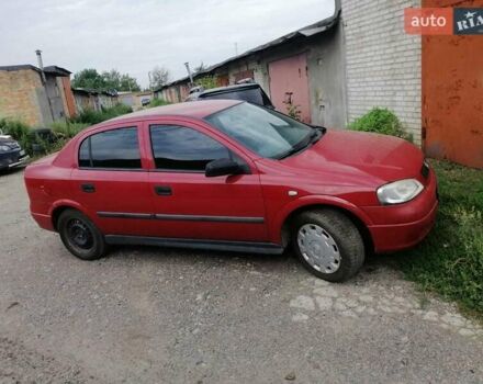 Красный Опель Астра, объемом двигателя 1.6 л и пробегом 150 тыс. км за 4000 $, фото 5 на Automoto.ua