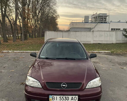 Красный Опель Астра, объемом двигателя 1.39 л и пробегом 187 тыс. км за 4800 $, фото 1 на Automoto.ua