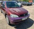 Красный Опель Астра, объемом двигателя 1.6 л и пробегом 229 тыс. км за 3500 $, фото 1 на Automoto.ua