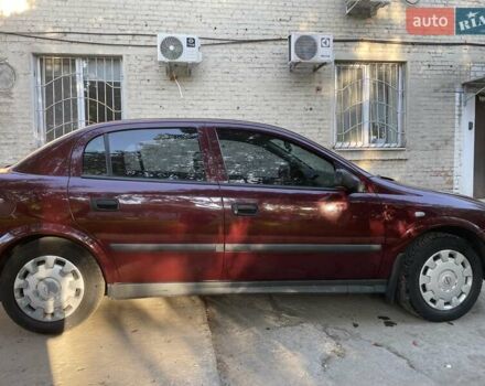 Красный Опель Астра, объемом двигателя 1.4 л и пробегом 177 тыс. км за 4600 $, фото 9 на Automoto.ua