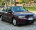 Красный Опель Астра, объемом двигателя 1.6 л и пробегом 248 тыс. км за 3600 $, фото 1 на Automoto.ua