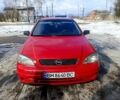 Червоний Опель Астра, об'ємом двигуна 1.4 л та пробігом 199 тис. км за 1355 $, фото 1 на Automoto.ua