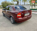 Красный Опель Астра, объемом двигателя 1.4 л и пробегом 102 тыс. км за 4750 $, фото 7 на Automoto.ua