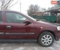 Красный Опель Астра, объемом двигателя 1.4 л и пробегом 170 тыс. км за 4300 $, фото 1 на Automoto.ua
