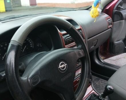 Красный Опель Астра, объемом двигателя 1.4 л и пробегом 160 тыс. км за 3500 $, фото 18 на Automoto.ua