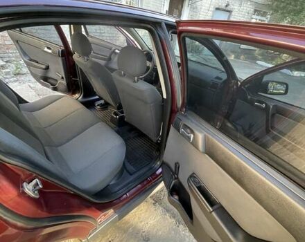 Красный Опель Астра, объемом двигателя 1.4 л и пробегом 177 тыс. км за 4600 $, фото 27 на Automoto.ua