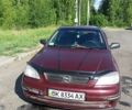 Красный Опель Астра, объемом двигателя 1.6 л и пробегом 204 тыс. км за 3000 $, фото 1 на Automoto.ua