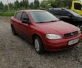 Красный Опель Астра, объемом двигателя 1.6 л и пробегом 150 тыс. км за 4000 $, фото 2 на Automoto.ua