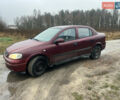Червоний Опель Астра, об'ємом двигуна 1.4 л та пробігом 230 тис. км за 2800 $, фото 1 на Automoto.ua