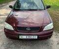 Красный Опель Астра, объемом двигателя 1.4 л и пробегом 195 тыс. км за 2750 $, фото 2 на Automoto.ua
