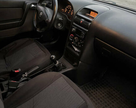 Красный Опель Астра, объемом двигателя 1.39 л и пробегом 187 тыс. км за 4800 $, фото 7 на Automoto.ua