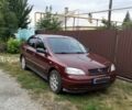 Красный Опель Астра, объемом двигателя 1.6 л и пробегом 216 тыс. км за 4800 $, фото 4 на Automoto.ua