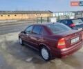Красный Опель Астра, объемом двигателя 1.4 л и пробегом 280 тыс. км за 3450 $, фото 19 на Automoto.ua