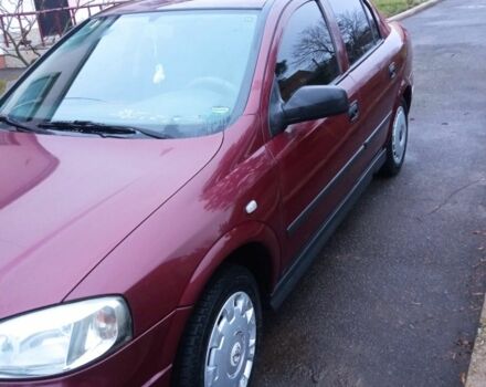 Красный Опель Астра, объемом двигателя 1.4 л и пробегом 160 тыс. км за 3500 $, фото 4 на Automoto.ua