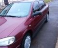 Красный Опель Астра, объемом двигателя 1.4 л и пробегом 160 тыс. км за 3500 $, фото 4 на Automoto.ua