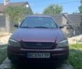 Червоний Опель Астра, об'ємом двигуна 1.6 л та пробігом 258 тис. км за 3000 $, фото 2 на Automoto.ua