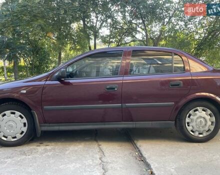 Красный Опель Астра, объемом двигателя 1.4 л и пробегом 177 тыс. км за 4600 $, фото 5 на Automoto.ua