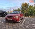 Красный Опель Астра, объемом двигателя 1.4 л и пробегом 135 тыс. км за 3500 $, фото 1 на Automoto.ua