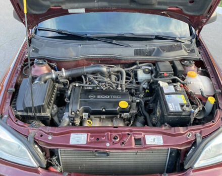 Красный Опель Астра, объемом двигателя 1.36 л и пробегом 173 тыс. км за 4800 $, фото 8 на Automoto.ua