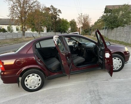 Опель Астра 2008 в Кобеляках на Automoto.ua Красный Опель Астра, объемом двигателя 1.4 л и пробегом 104 тыс. км за 4450 $, фото 8 на Automoto.ua