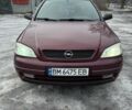 Красный Опель Астра, объемом двигателя 1.4 л и пробегом 100 тыс. км за 3500 $, фото 1 на Automoto.ua