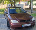 Красный Опель Астра, объемом двигателя 1.4 л и пробегом 229 тыс. км за 4900 $, фото 1 на Automoto.ua