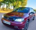 Червоний Опель Астра, об'ємом двигуна 1.6 л та пробігом 245 тис. км за 4500 $, фото 1 на Automoto.ua