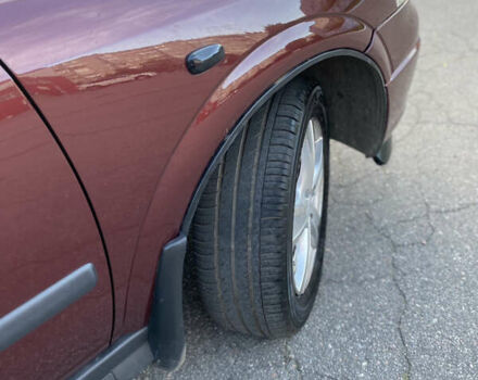 Красный Опель Астра, объемом двигателя 1.36 л и пробегом 173 тыс. км за 4800 $, фото 14 на Automoto.ua