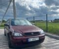 Червоний Опель Астра, об'ємом двигуна 1.4 л та пробігом 245 тис. км за 3300 $, фото 1 на Automoto.ua