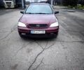 Красный Опель Астра, объемом двигателя 1.4 л и пробегом 100 тыс. км за 3000 $, фото 1 на Automoto.ua