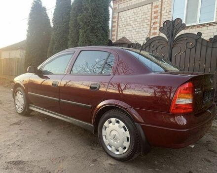 Красный Опель Астра, объемом двигателя 1.4 л и пробегом 90 тыс. км за 4500 $, фото 1 на Automoto.ua