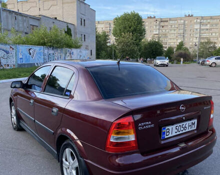 Красный Опель Астра, объемом двигателя 1.36 л и пробегом 173 тыс. км за 4800 $, фото 3 на Automoto.ua
