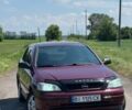 Красный Опель Астра, объемом двигателя 1.6 л и пробегом 183 тыс. км за 4500 $, фото 1 на Automoto.ua