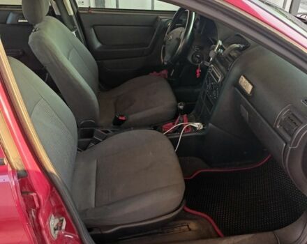 Красный Опель Астра, объемом двигателя 1.6 л и пробегом 190 тыс. км за 3700 $, фото 11 на Automoto.ua