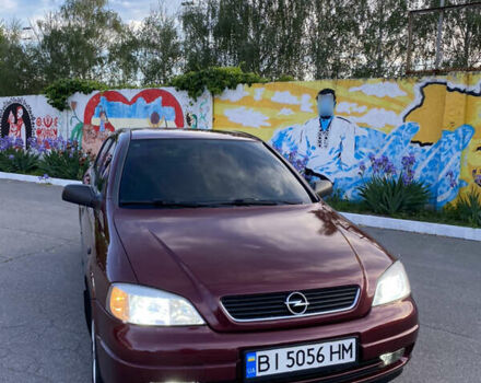 Красный Опель Астра, объемом двигателя 1.36 л и пробегом 173 тыс. км за 4800 $, фото 1 на Automoto.ua